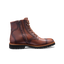 Brown leather boot on a white background